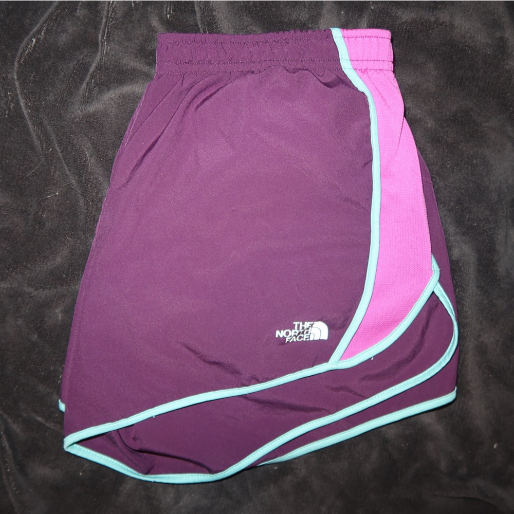 Purple “North Face” active shorts.
